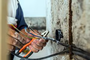 Trainee electrician fined after person shocked by exposed live wire