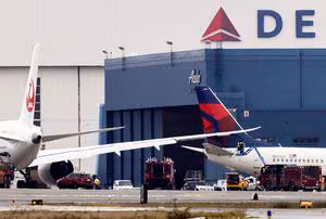 Japan Airlines flight hits tail of parked plane at Seattle's airport