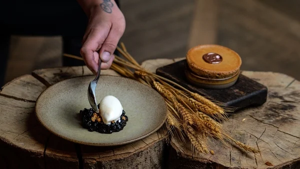 Niklas Ekstedt's ceps souffle with blueberries and milk ice cream
